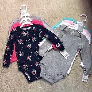 Baby 7 piece long sleeve onesies.